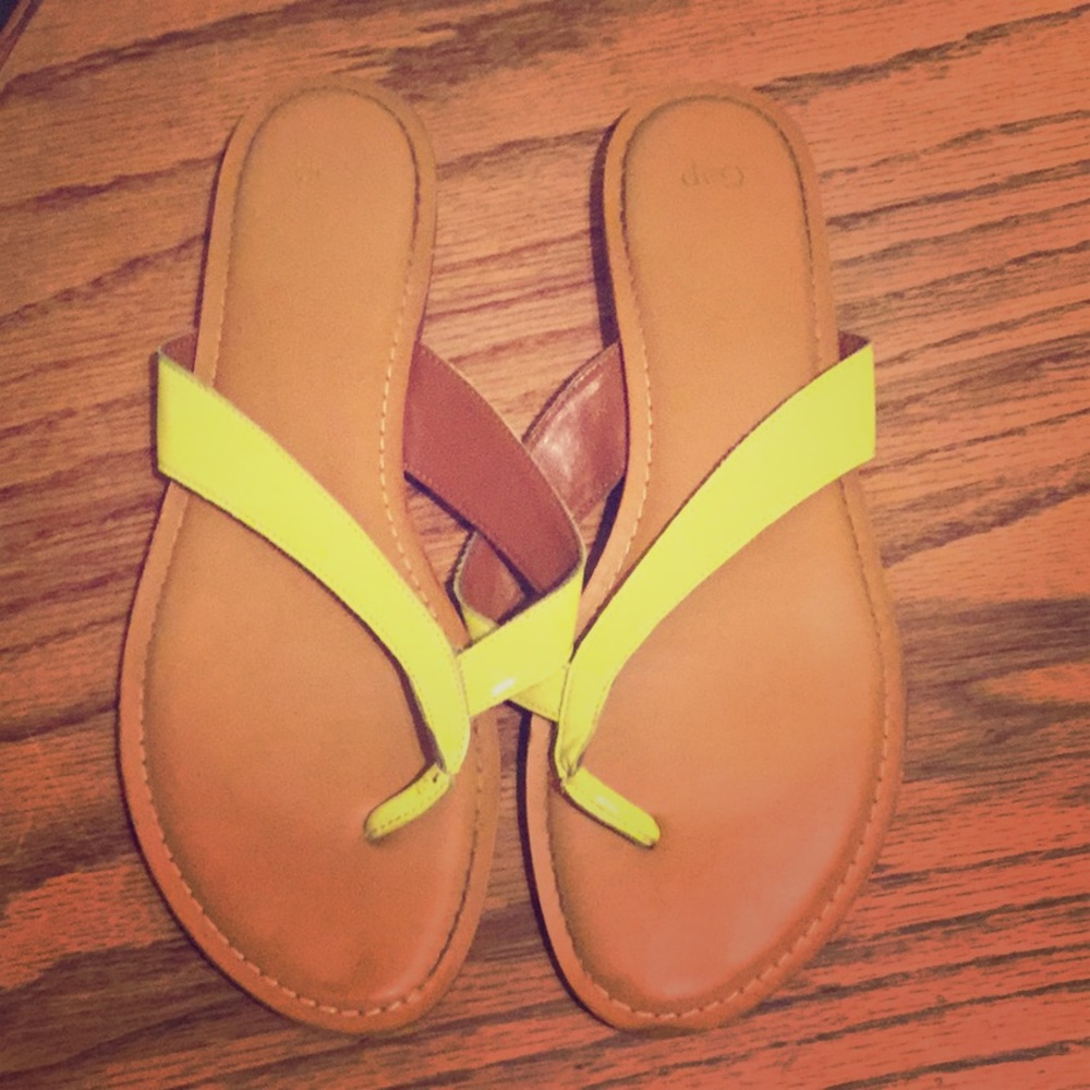 Neon yellow/green flip flops.
